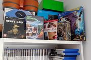 Large collection of PlayStation 2 games and console