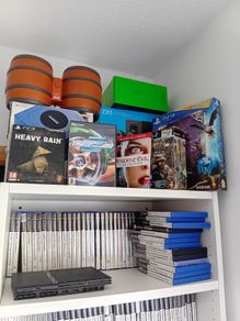 Large collection of PlayStation 2 games and console