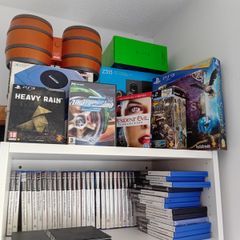 Large collection of PlayStation 2 games and console