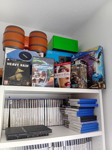 Large collection of PlayStation 2 games and console
