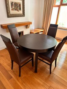 extendable table and six chairs