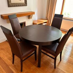 extendable table and six chairs