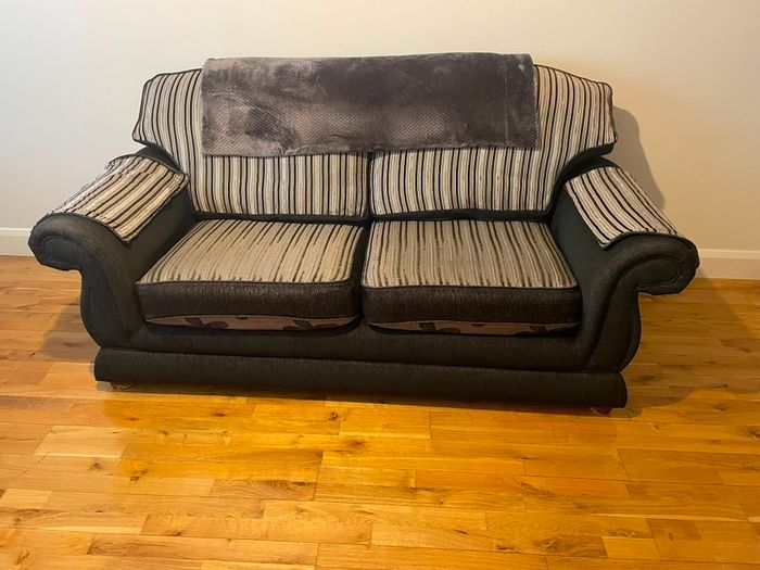 Two three seater sofas