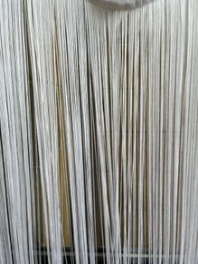 This is a white string curtain