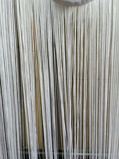 This is a white string curtain