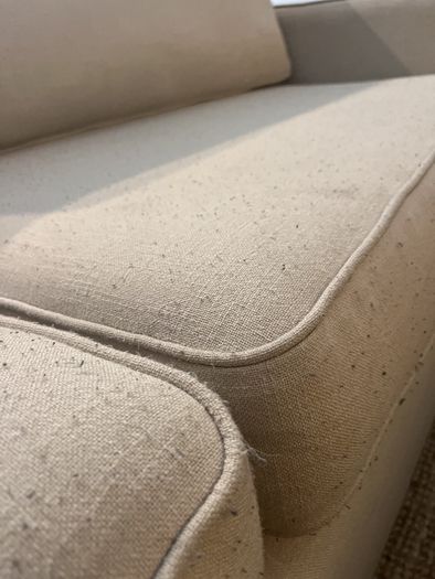 large L shaped cream sofa