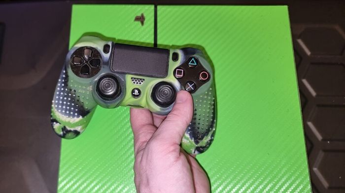 Playstation 4 with two controllers
