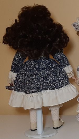 9 x  Porcelain dolls