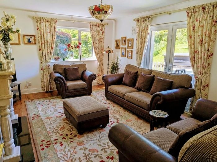 Luxury leather and fabric three piece suite