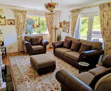 Luxury leather and fabric three piece suite