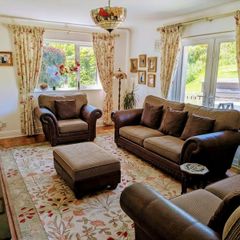Luxury leather and fabric three piece suite