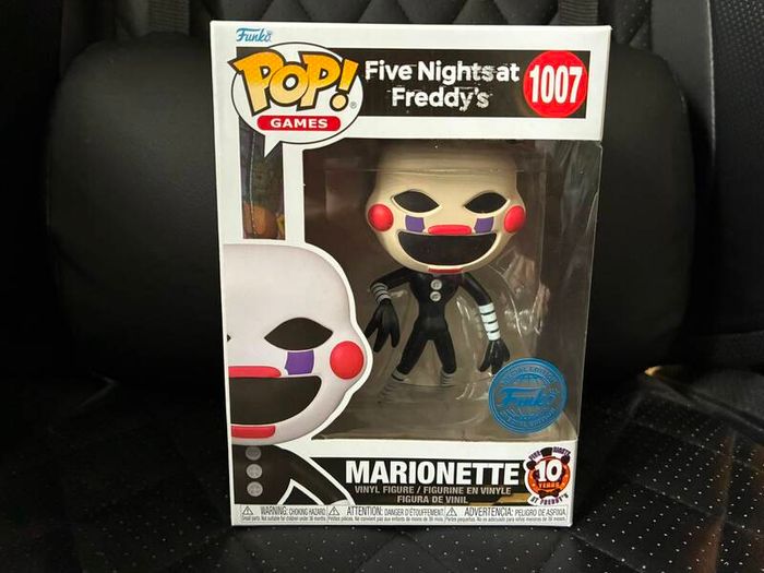 Five Nights at Freddys plushies and dragon figures