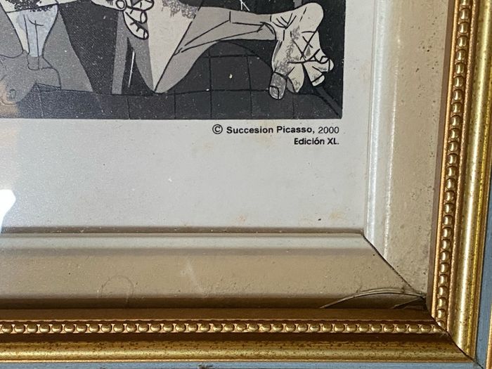 This piece is a ceramic art tile featuring Pablo Picasso's iconic masterpiece, Guernica (1937)