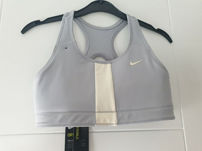 New Nike Reverse top size L (12-13 years)
