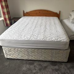5ft Bed that splits on two. Includes the mattress and headboard.