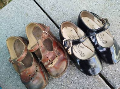 2 pairs of old childrens shoes
