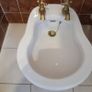 Bathroom sink, bath and bidet. Image 4