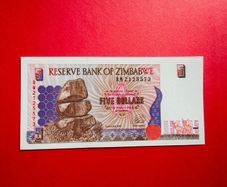 Zimbabwe  5 Dollars  1997  Verified Under Uv Light.  ( Uncirculated )