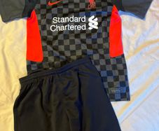 Liverpool boys jersey and shorts