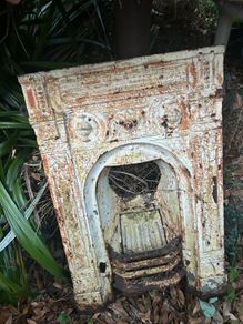 Antique cast iron fireplace insert