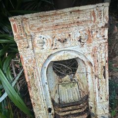 Antique cast iron fireplace insert