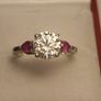 Moissanite Solitaire Ring with Natural Ruby Accents Image 10