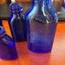 Antique bottles milk of magnesia Image 2
