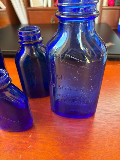 Antique bottles milk of magnesia