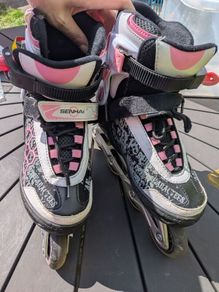 pink and white girls rollerblades