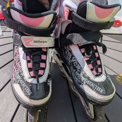 pink and white girls rollerblades