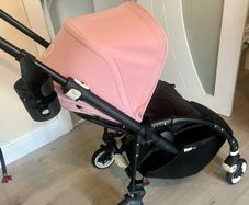 Bugaboo Bee with pink hood and footmuff