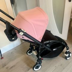 Bugaboo Bee with pink hood and footmuff