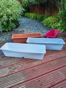 Four large window boxes