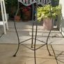vintage wrought iron and rattan tall plant stand Image 2