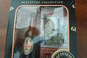 Guinness miniature bottle and glass.