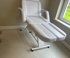 podiatry Bed, split leg levels. Tray holder