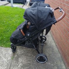 Double buggy comes with rain cover footmuffs and baby cacoon used 3-4 times