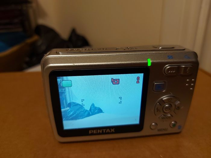 Pentax Optio E40, 8.1 megapixels, Takes 2 AA Batteries, working great and in excellent cosmetic condition