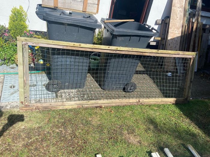 Large wooden frame with wire