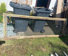 Large wooden frame with wire