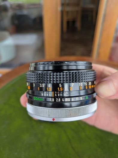 Canon AE-1 + FD 50mm f/1.8 + Tokina 28mm f/2.8
