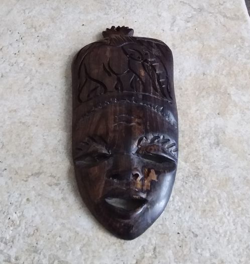 Handcarved Wooden Tribal Mask with Elephant Carving