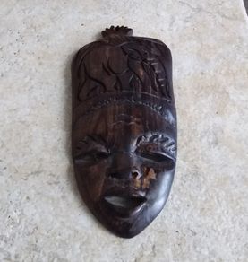 Handcarved Wooden Tribal Mask with Elephant Carving