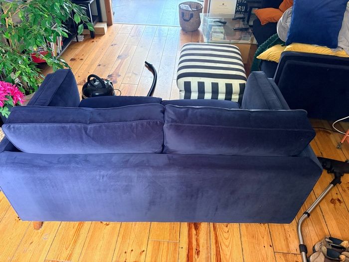 Two seater couch in navy velvet for sale