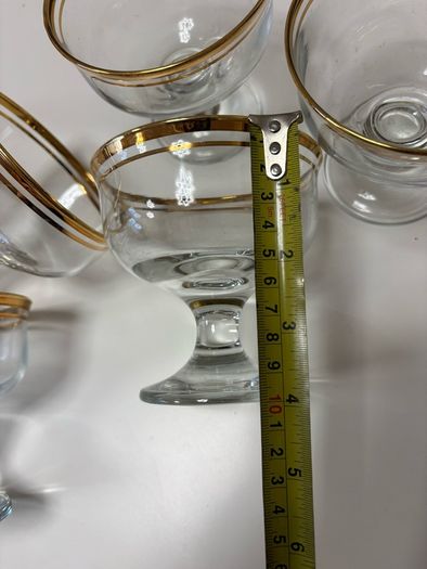 Set of six clear glass footed dessert dishes with gold-trimmed rims