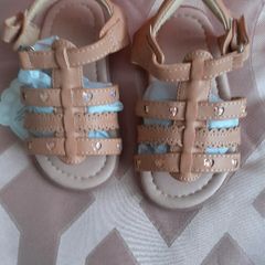2 pairs of girls leather sandles size 6 junior .Lovely tan colour with little pink hearts .Ordered the wrong size 10 each