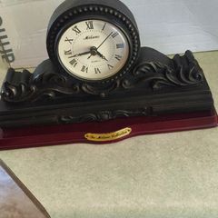 Vintage Bronze-toned Table Clock - Quartz Movement with Wooden Base by The Milano Collection in working order.