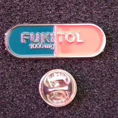 Fukitol 1000mg , pin back badge.