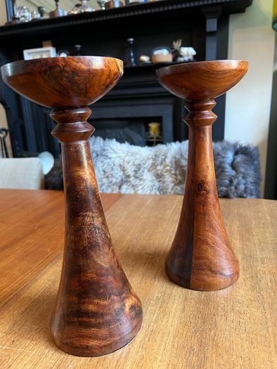 Pair of mixed wood with metal insert candlestick holders