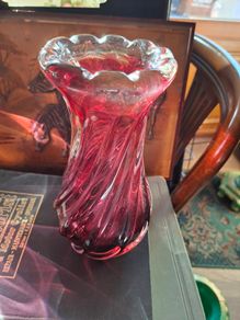 Large Heavy Mid-Century Chribska Glass-works Cranberry Art Glass Vase designed by Josef Hospodka and features a distinctive twisted silhouette with a cased glass finish